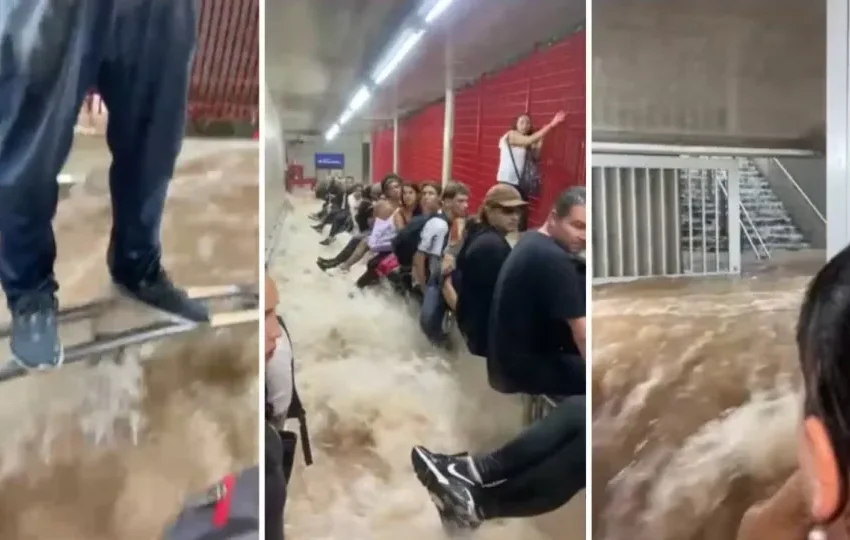 Passageiros se agarram a grades em inundação do metrô em SP; vídeo